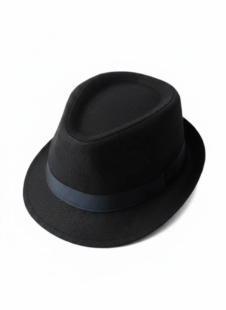 Black fedora hat with a dark ribbon band and short brim on a white background