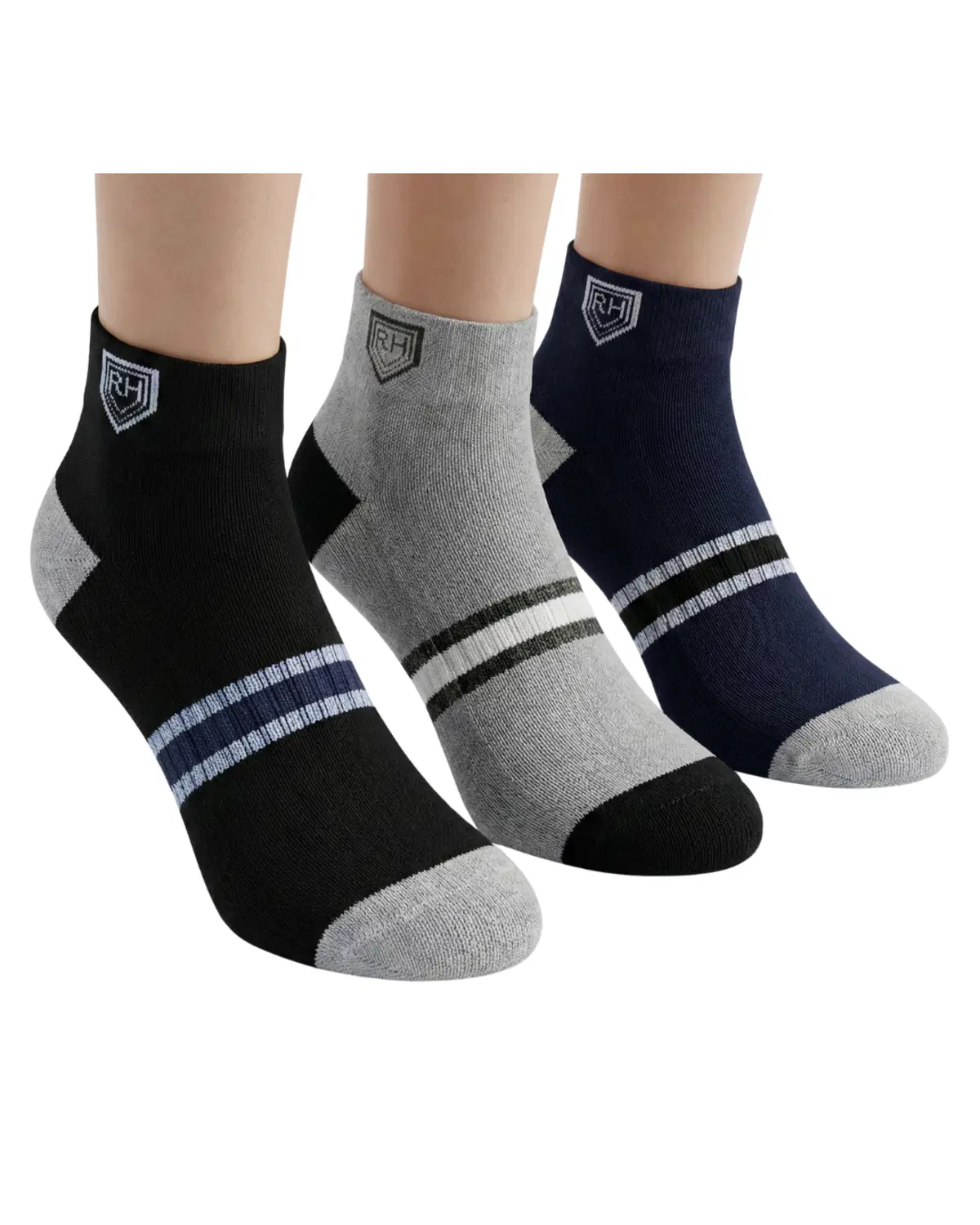 Three ankle socks worn on feet in black, grey and navy with RH logo and contrast striped detail
