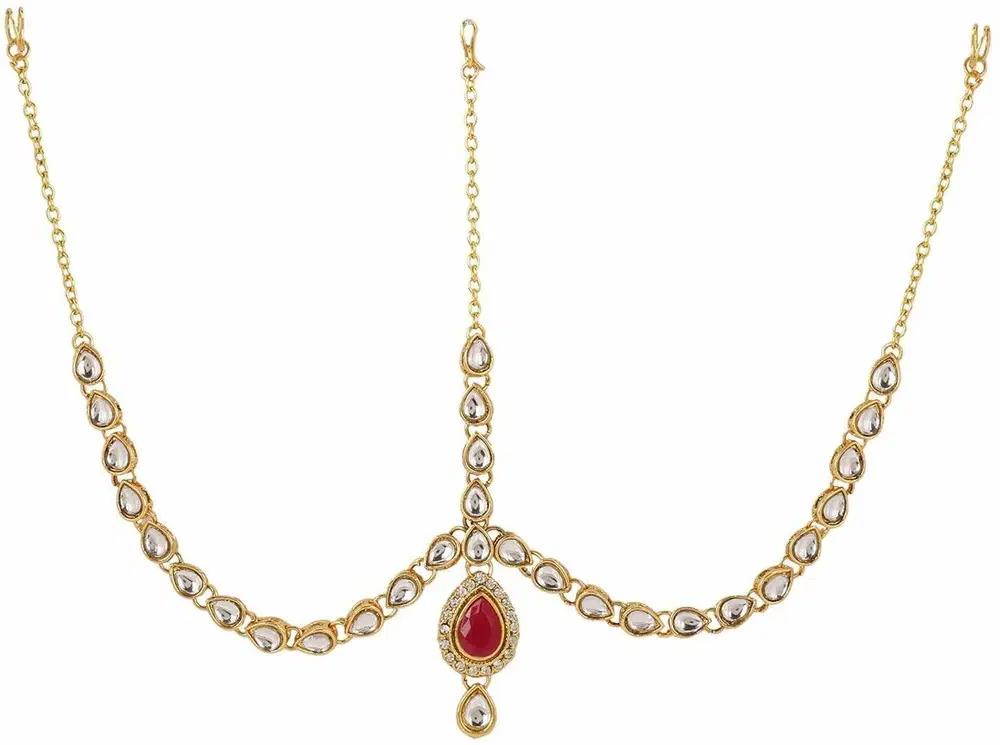 Gold-toned maang tikka with clear teardrop stones and a red teardrop center on white background