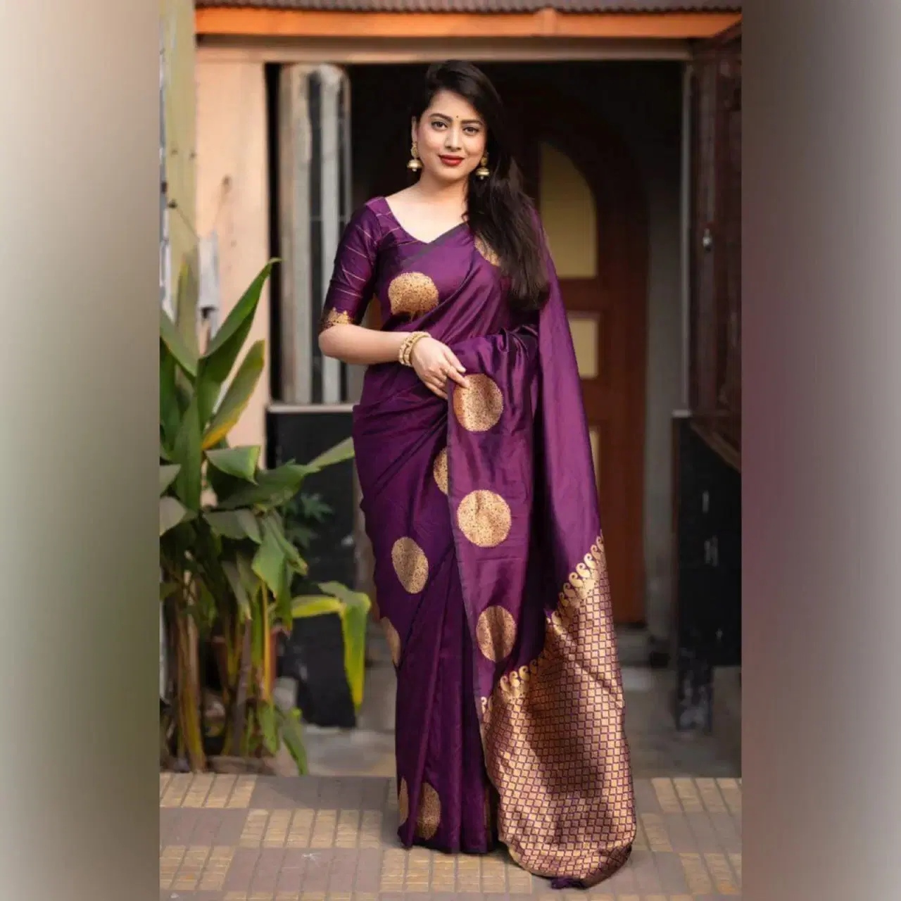 Purple Banarasi soft silk saree with gold zari motifs and jacquard pallu border
