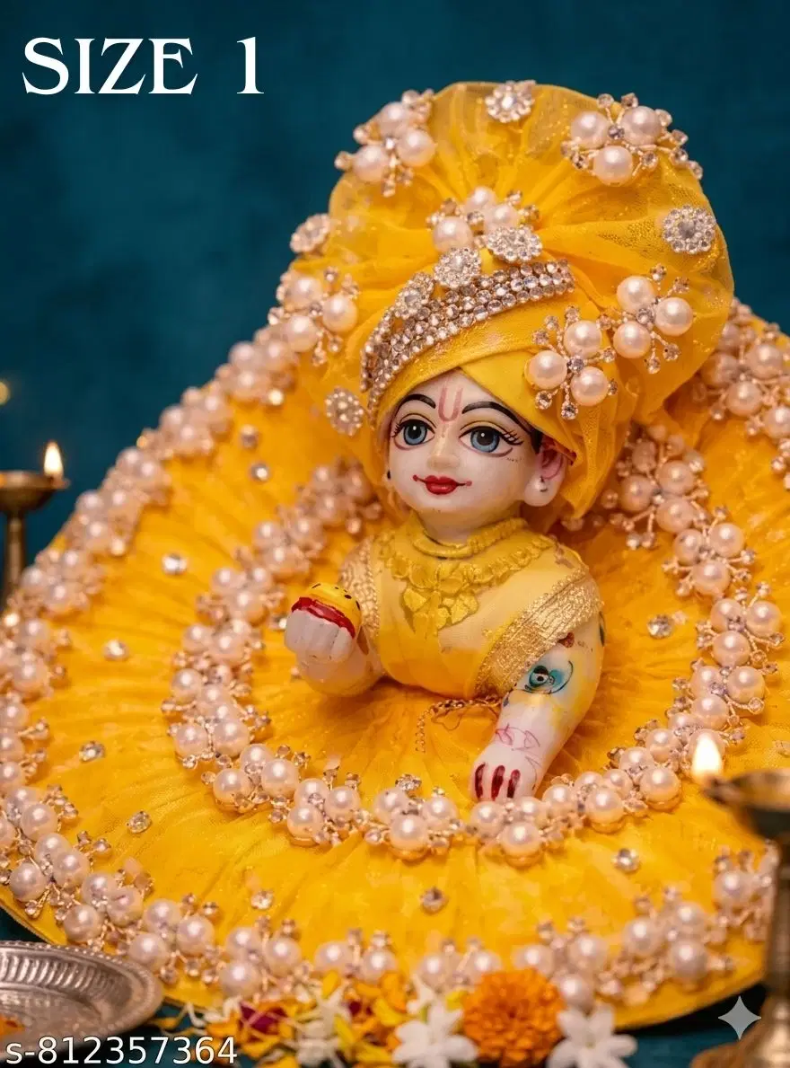 Laddu Gopal idol in bright yellow embellished attire with pearl detailing and crown, shown with Size 1 text