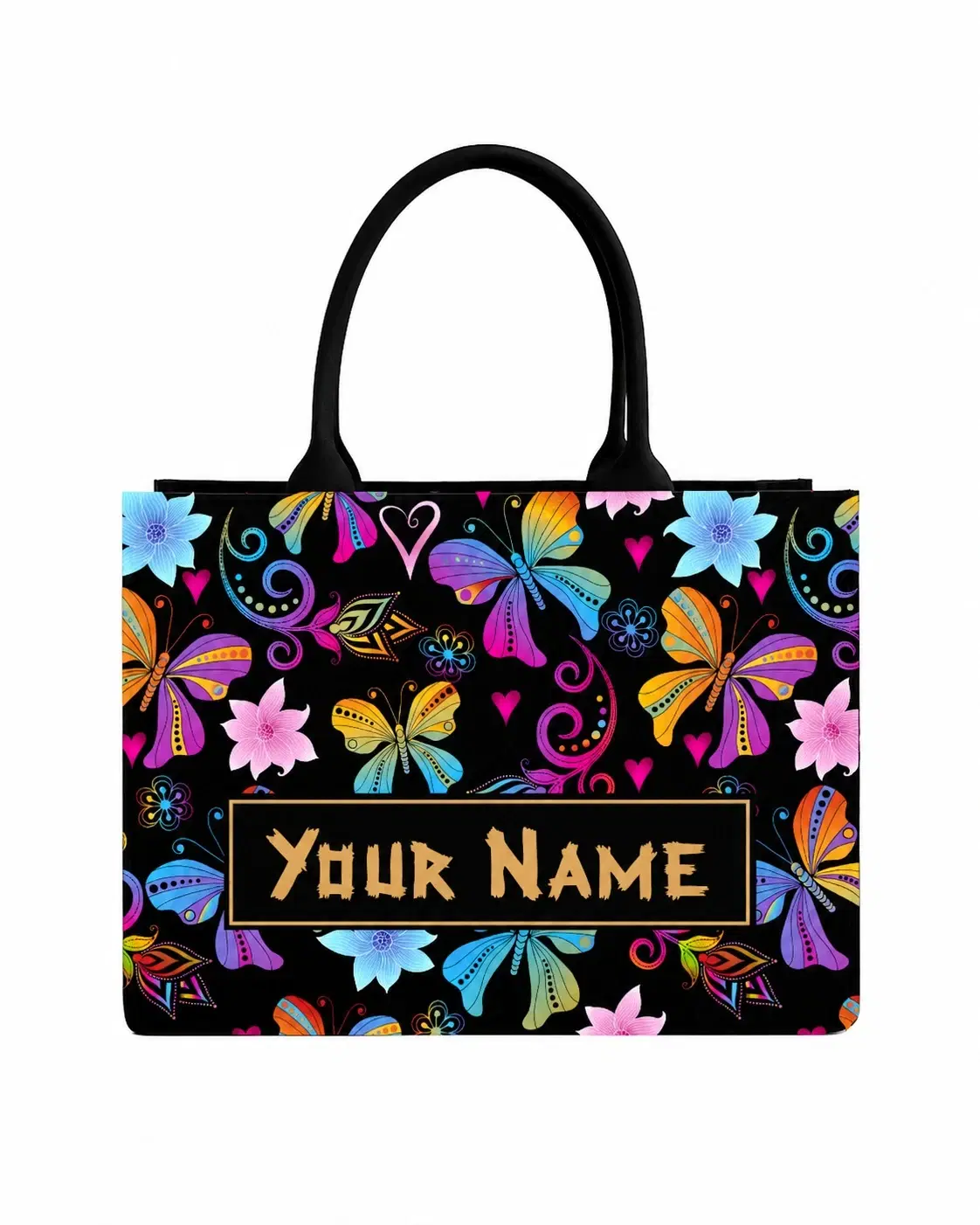 Front view of black tote with colorful butterflies, flowers, hearts, and personalized gold name panel