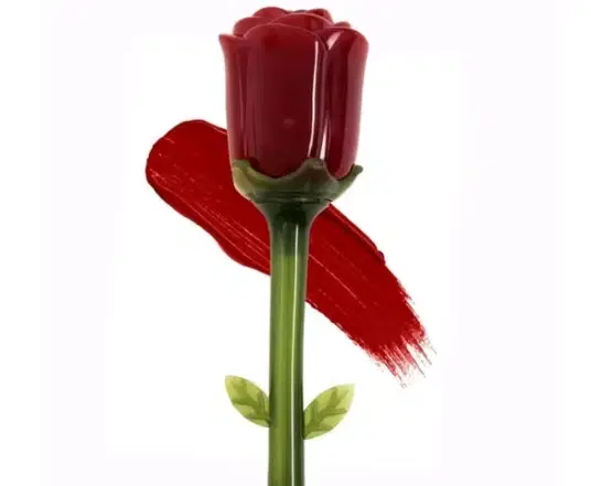 Red rose-shaped lipstick with green stem case shown against a maroon sindoor swatch on white background