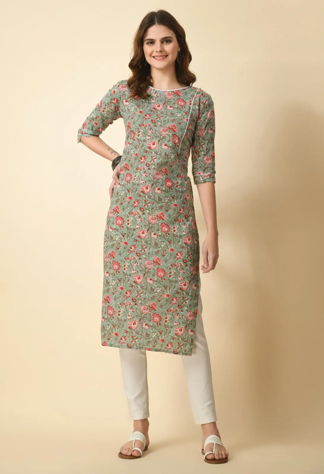 Front full-length view of sage green floral straight kurta with round neck and rolled three-quarter sleeves