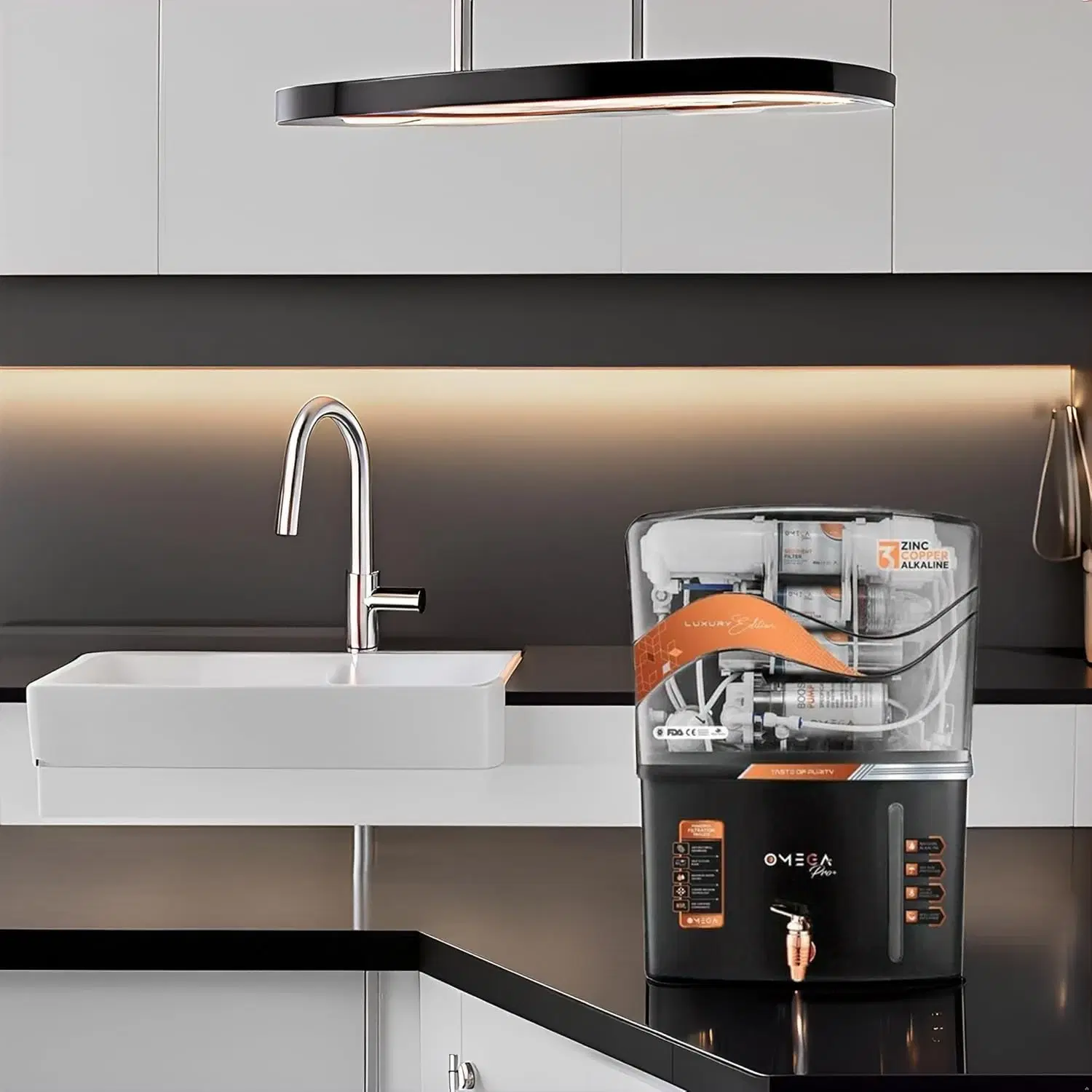 Omega Pro black countertop water purifier beside a white sink, with clear upper tank and front tap