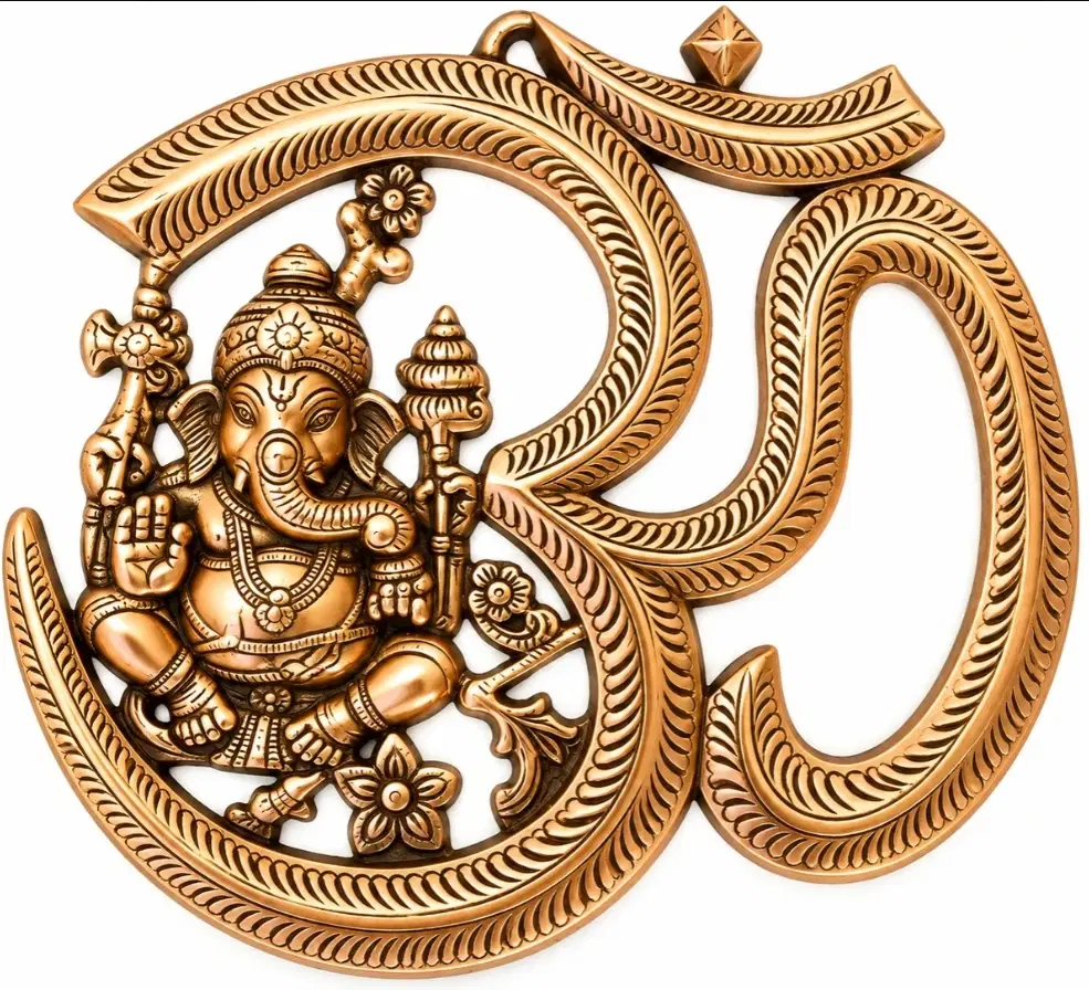 Front view of ornate Om wall decor with seated Ganesha motif in antique gold finish on white background